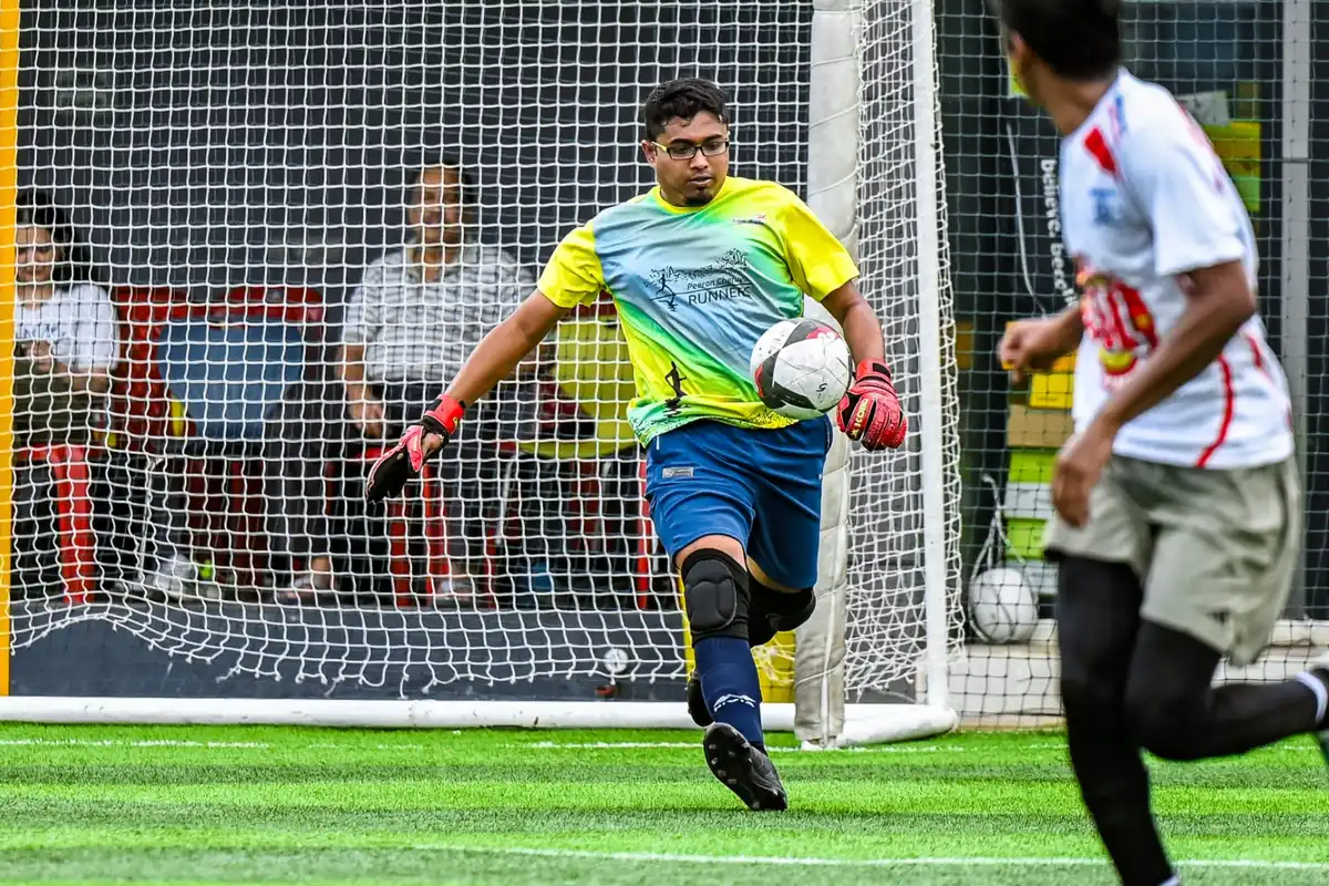 Animesh Mitra playing football